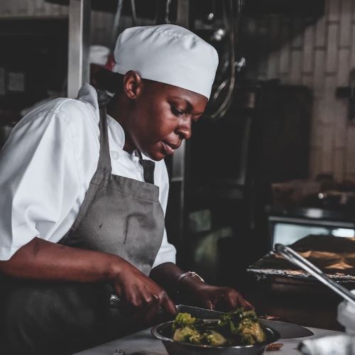 picture of a chef preparing dishes